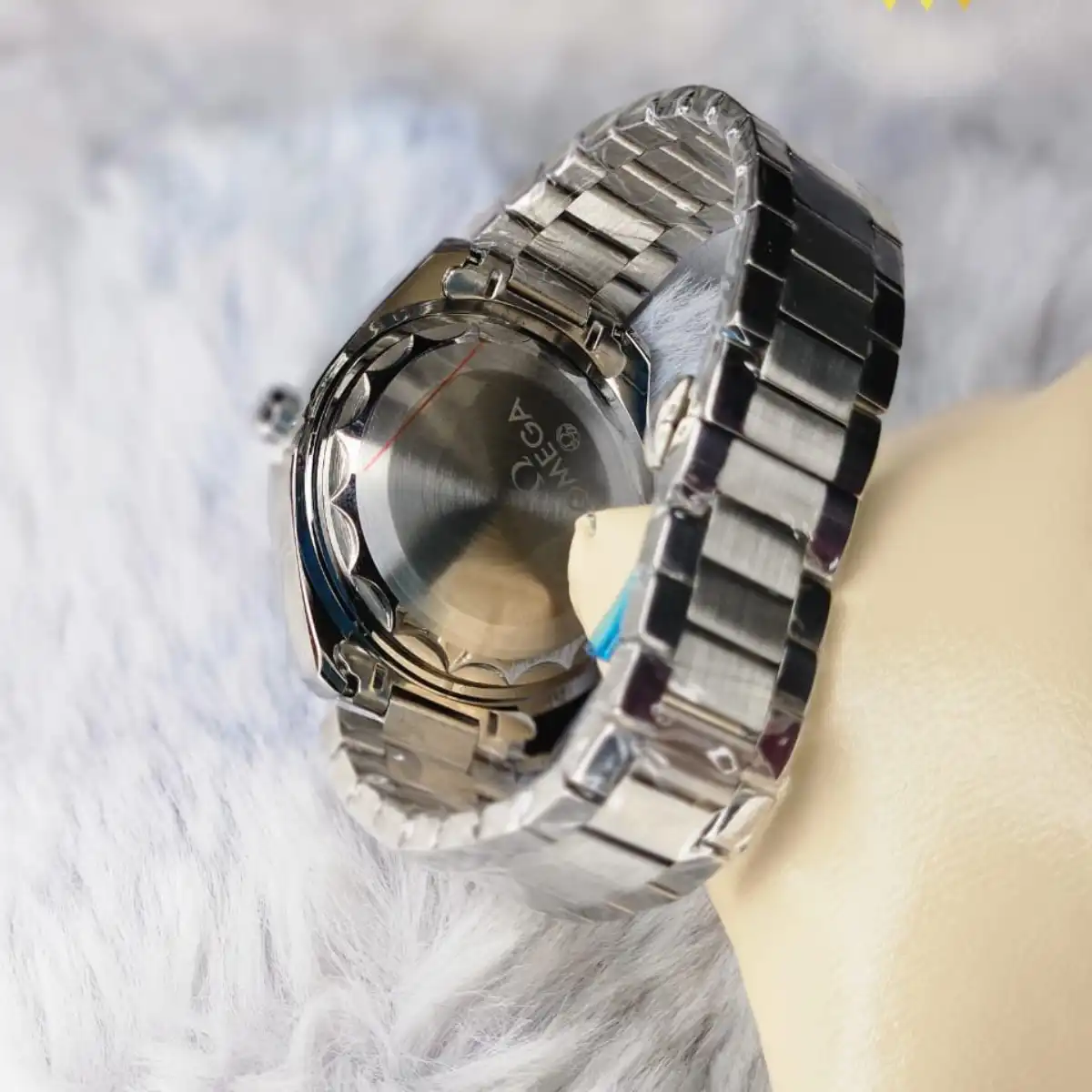 Back plate showing the stainless steel engraving of the Omega Premium Quartz Watch